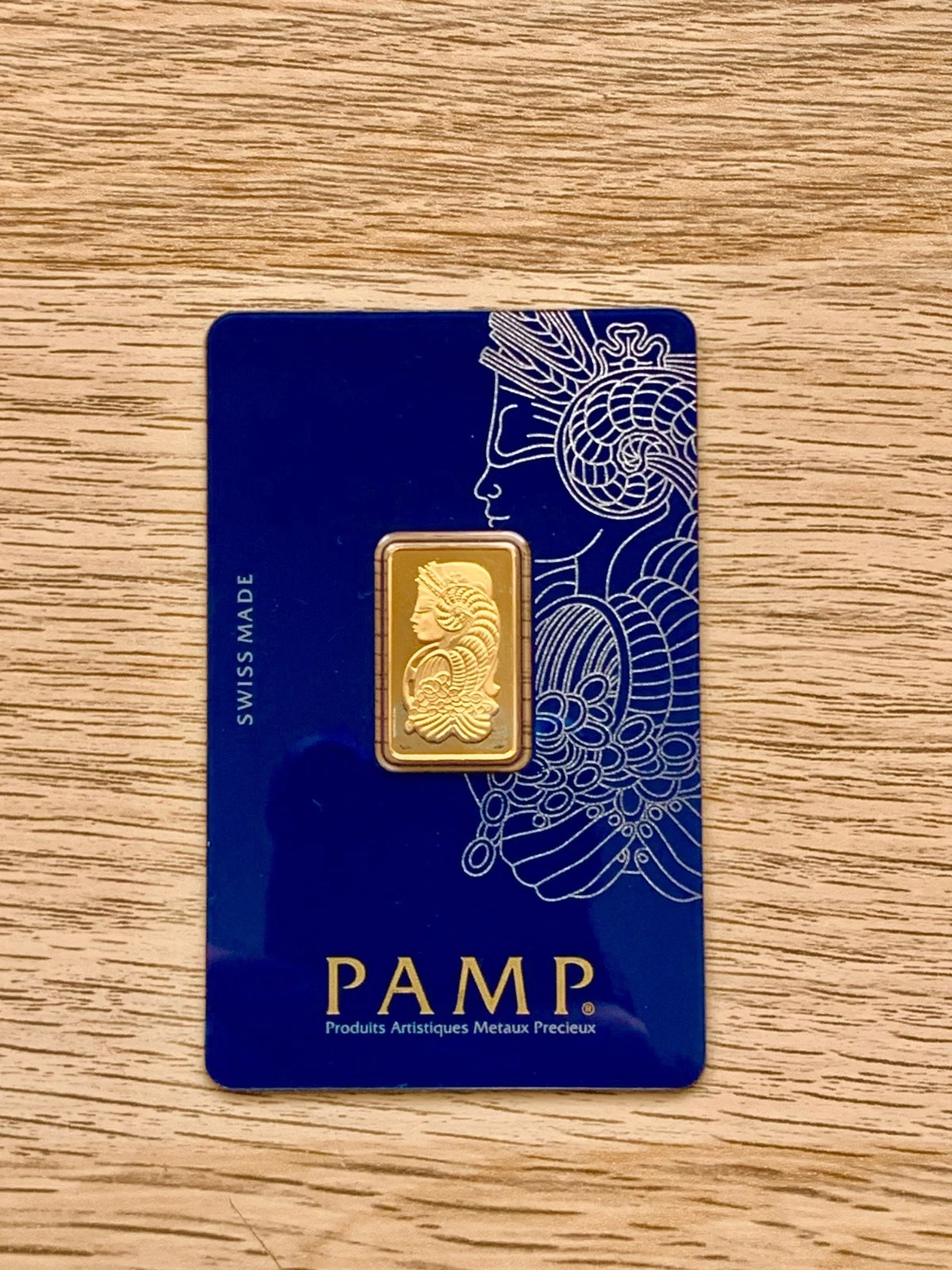 5g Suisse Design Bar Ingot, in its assay card.